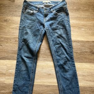 Forever 21 low-rise medium to dark wash jeans (size 26)